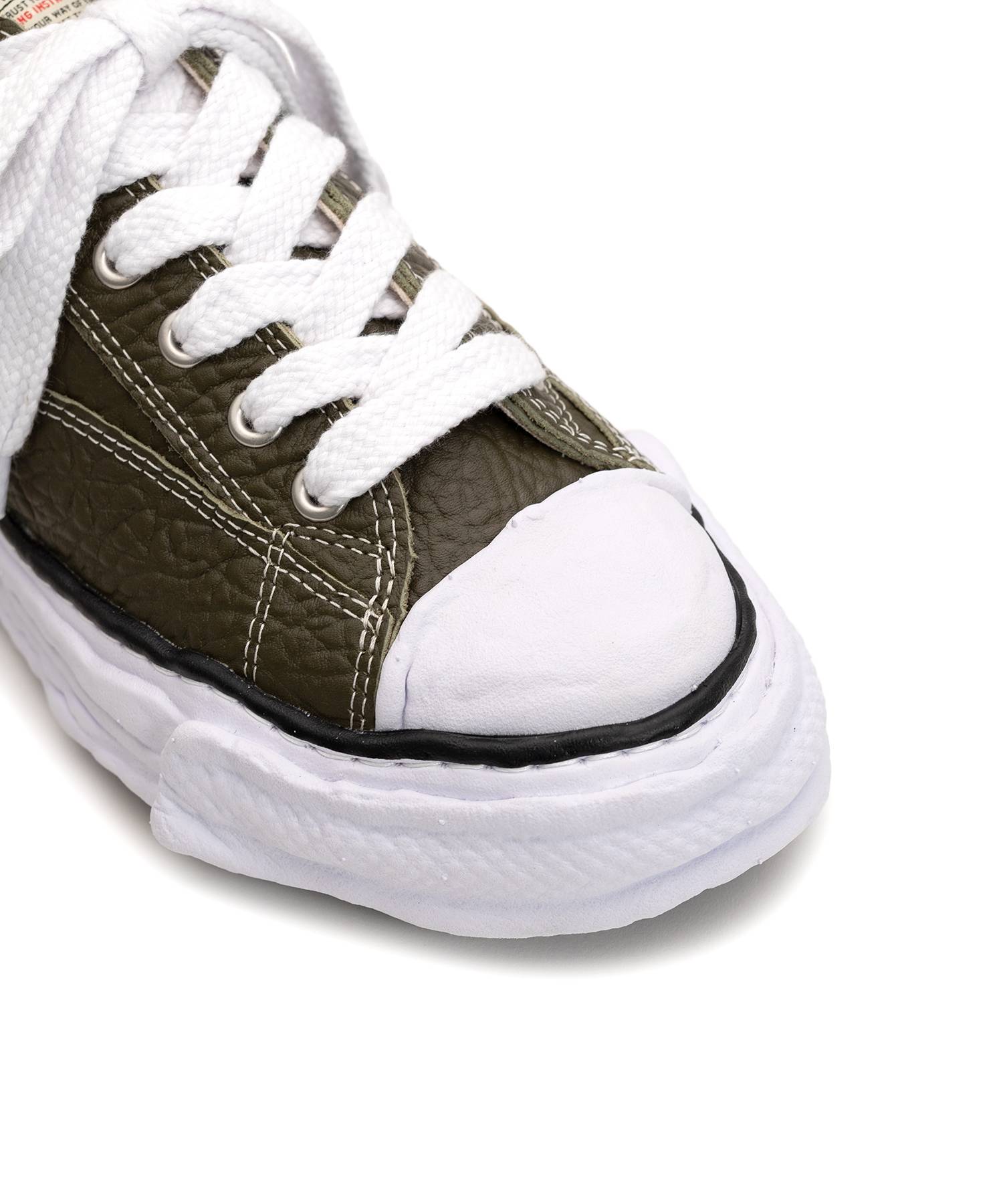 "PETERSON23" OG Sole Monster Leather Low-top Sneaker