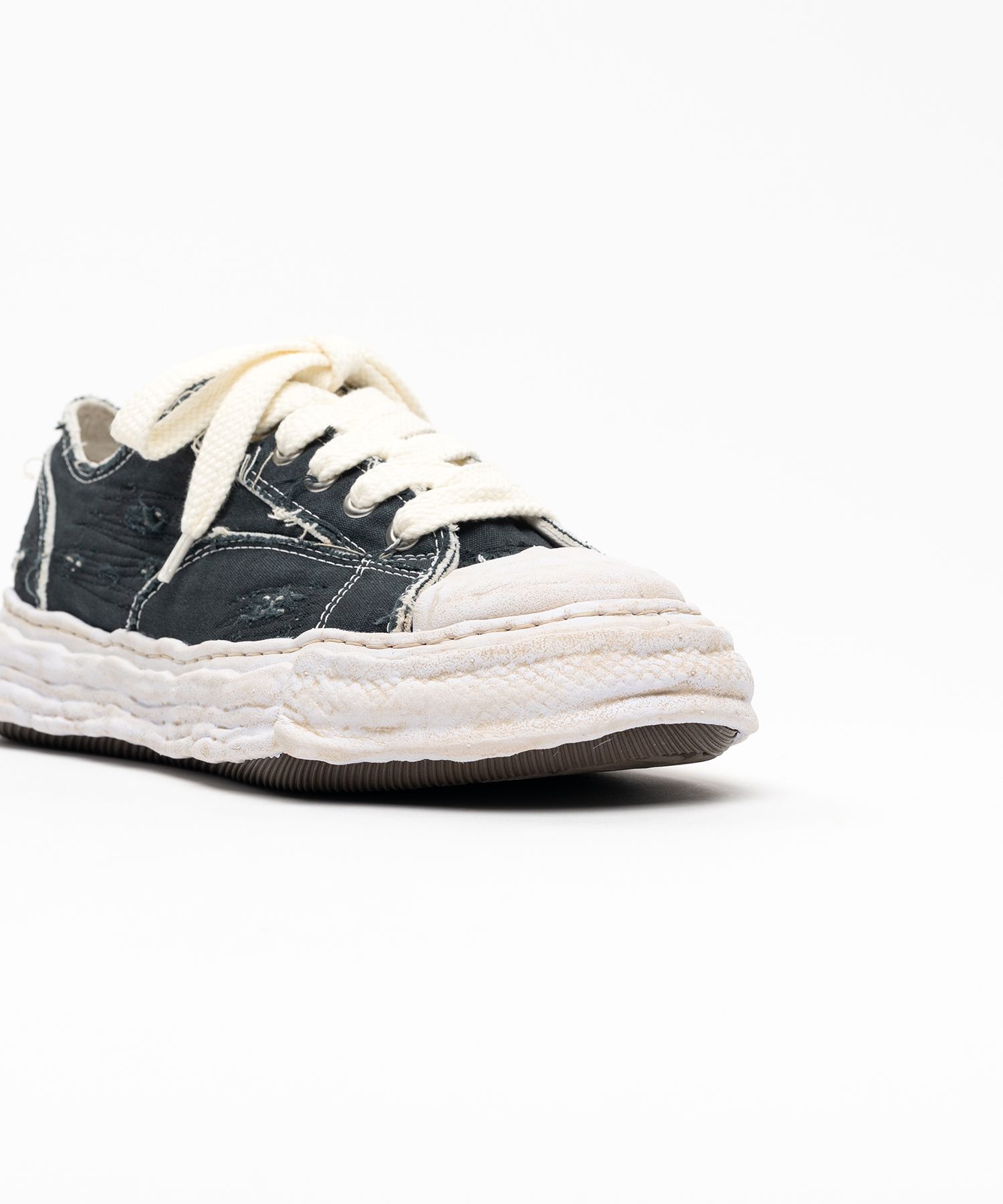 "PETERSON23" OG Sole Ripped Overdye Canvas Low-top Sneaker