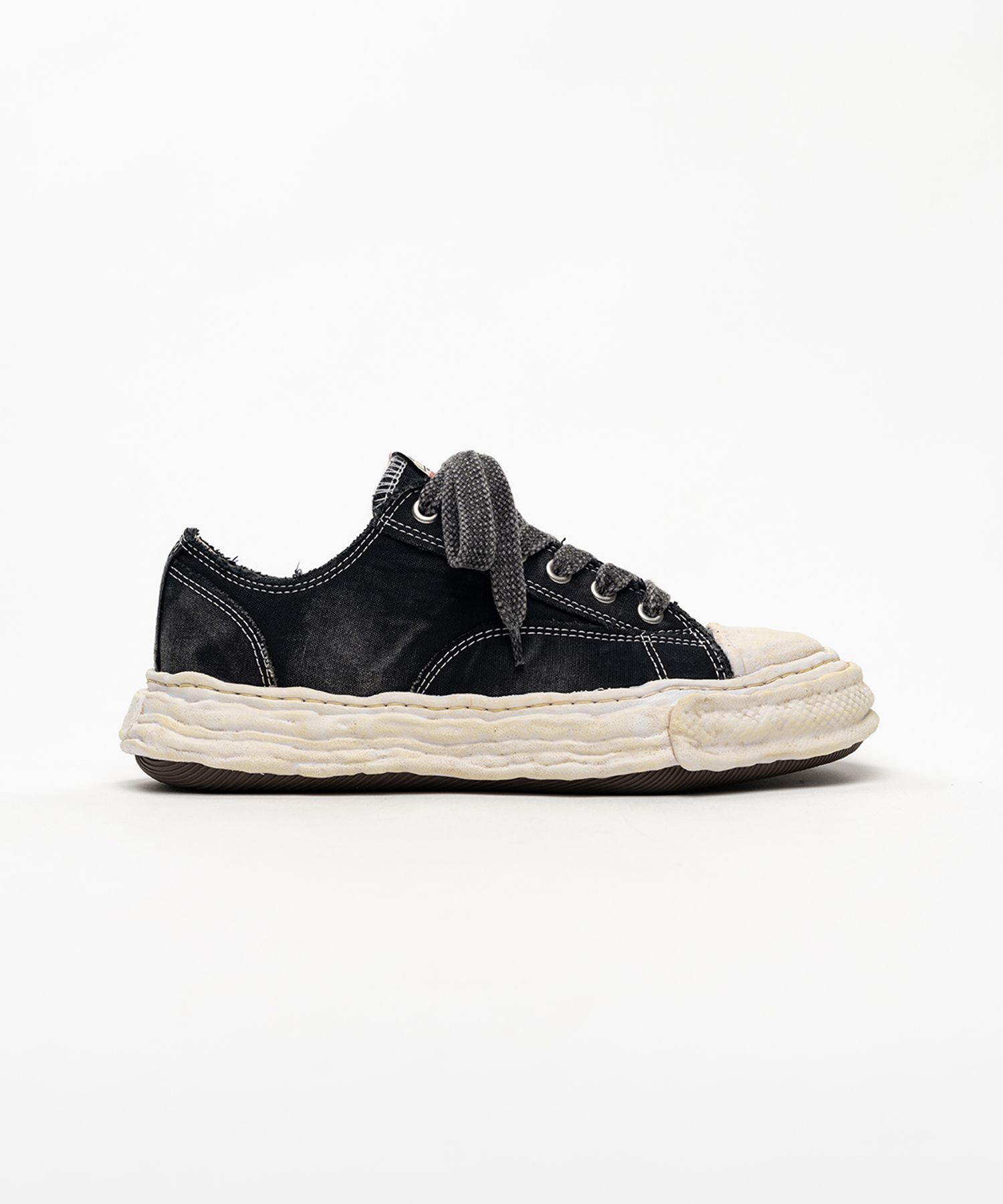 "PETERSON23" OG Sole Bleached Canvas Low-top Sneakers