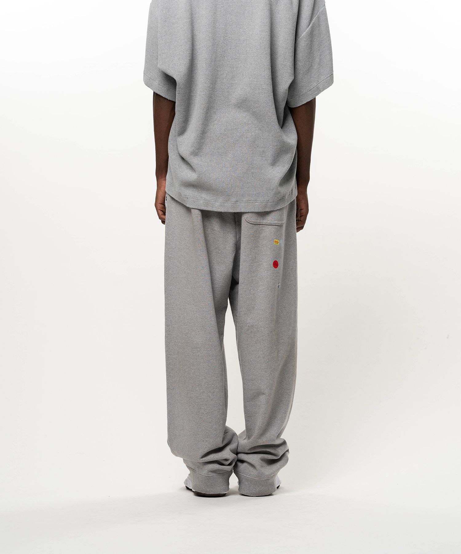 Price Tag Sticker Printed Sweat Pants