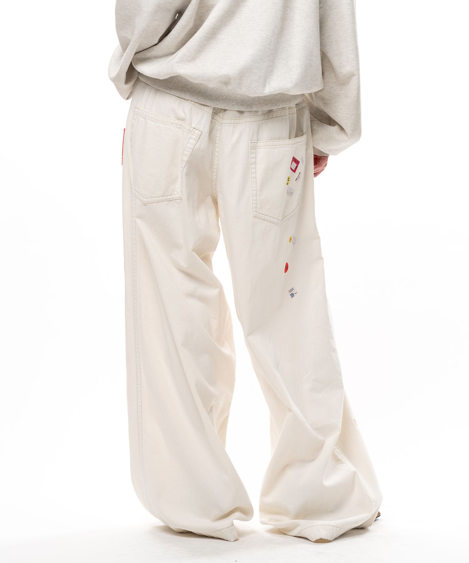 Price Tag Sticker Printed Wide Denim Pants